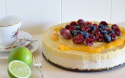 Mango Lime Cheesecake with Rasberries, Blueberries & Mango Coulis